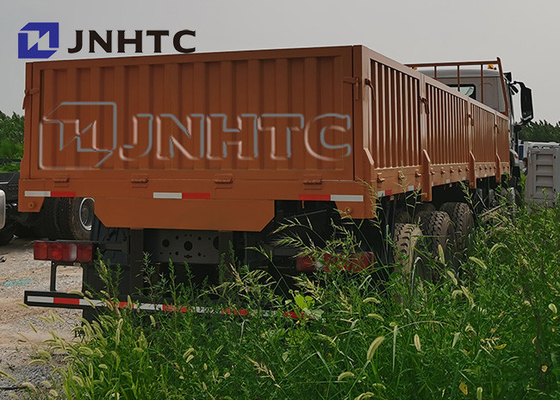Caminhões traseiros lisos 31tons Lhd de Sinotruk 8x4 Hohan com eixo de levantamento