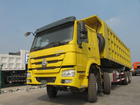 O caminhão basculante do isuzu de SINOTRUK Howo 8×4 70 toneladas carrega o modelo ZZ3317N4667A da caixa da descarga 30CBM