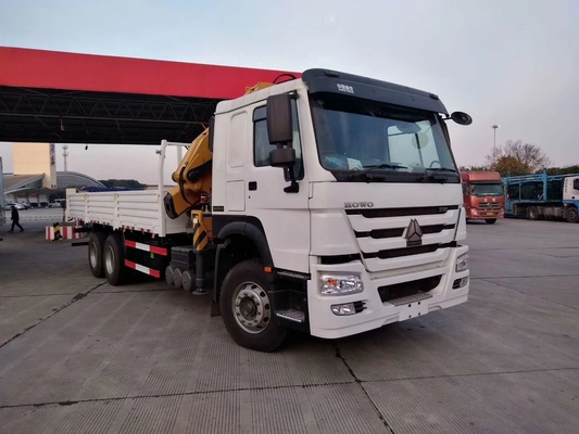 O caminhão de Sinotruk Howo 6x4 montou o punho do motorista da mão esquerda do Euro 2 do guindaste