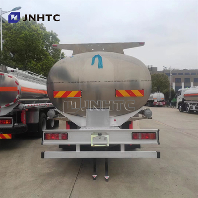 esquerda e assistente de 8x4 Howo que dirigem a capacidade grande do transportador do caminhão de tanque do óleo diesel