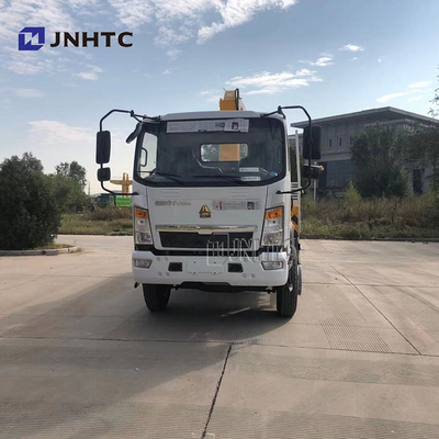 O caminhão da carga da placa lisa montou Crane Sinotruk HOWO 4x4 toda a movimentação da roda